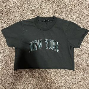 Brandy Melville, One size fits all top. Green “New York”.